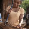 medium-shot-woman-working-with-wood